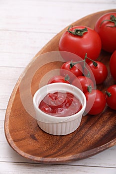 Tomato catchup and a tomato and mini-tomato