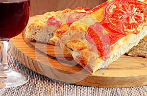 Tomato and cheese focaccia with wine