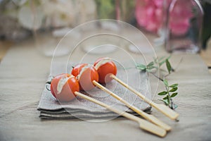Tomato and cheese skewers photo