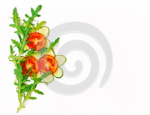 Tomato, cucumber, arugula leaves, border on white background