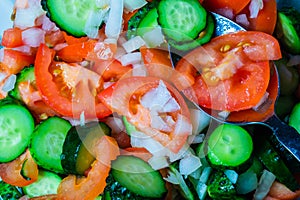 Tomato and cucumber salad. fresh chopped vegetables. healthy vegetarian food