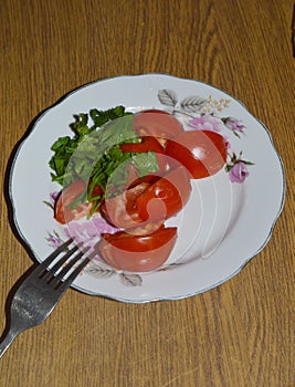 Tomato,cucumber salad on the plate