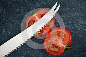 Tomato cut with a special tomato knife top view