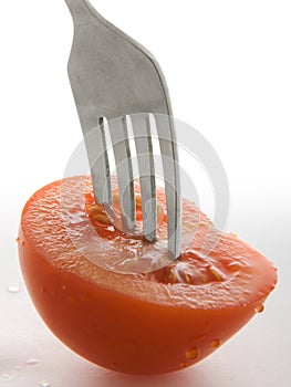 Tomato and fork photo