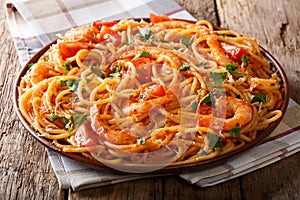 Tomato Fra Diavolo Sauce, Seafood and Pasta spaghetti close-up. photo