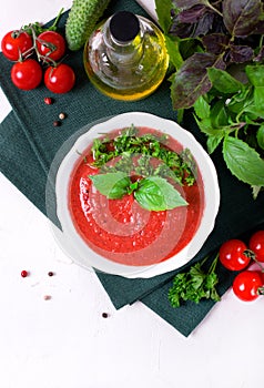 Tomato gazpacho soup in ceramic bowl