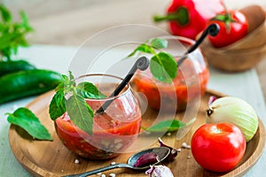 Tomato gazpacho soup in two glass cups