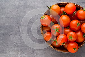 Tomato on the gray background.