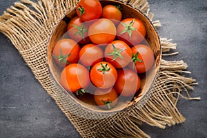 Tomato on the gray background.