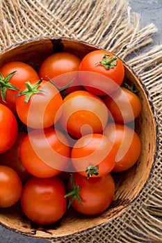 Tomato on the gray background