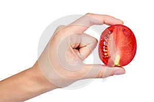 Tomato in hand isolated on white background