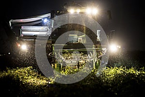 Tomato harvester working at night