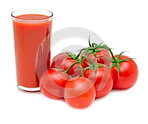 Tomato juice with branch of red tomatoes