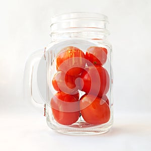 Tomato juice, drink, smoothie in a glass concept. Plum tomatoes