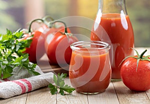 Tomato juice with fresh tomatoes and parsley