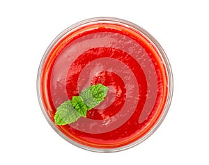 Tomato juice in glass with a mint leaf isolated on white background. Top view. Flat lay