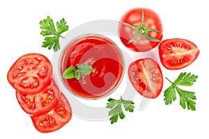 Tomato juice in glass and tomatoes with parsley leaves isolated on white background. Top view. Flat lay