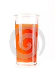 Tomato juice in a tall glass glass on a white background