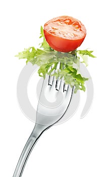 Tomato and lettuce on fork