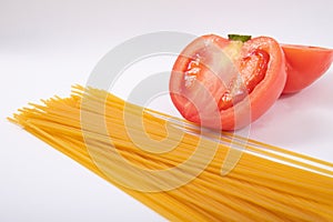 Tomato and pasta in white background