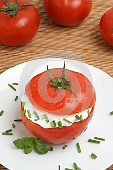 Tomato with lowfat cottage cheese and dill photo