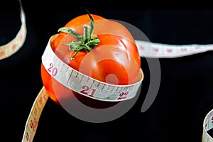 Tomato with measuring tape