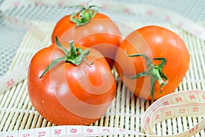 Tomato with measuring tape