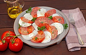 Tomato and mozzarella Caprese salad with sauce