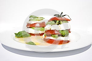 Tomato mozzarella salad with avocado