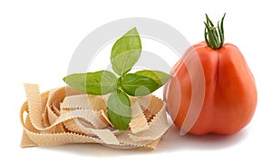 Tomato pappardelle and basil photo