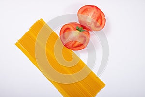 Tomato and pasta in white background