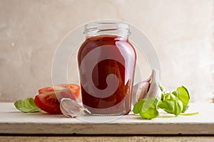 Tomato pizza sauce in jar. Homemade sauce for cooking pizza.