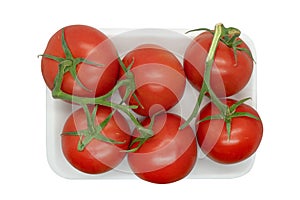 Tomato in plastic plate isolated on white background. Top view. Fresh cherry tomatoes isolated on white. Heap of tomato isolated