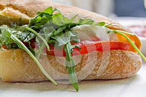 Tomato, rocket and mozarella sandwich