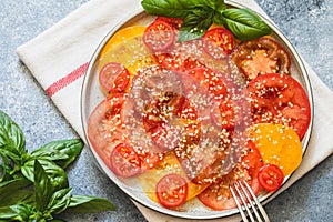 Tomato salad with hemp seeds. healthy food concept with superfoods