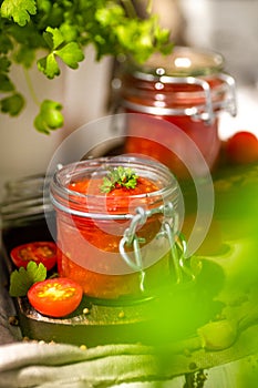Tomato salsa in a glass jar