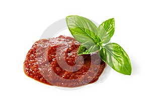 Tomato sauce and basil on white background