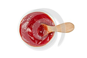 Tomato sauce in glass bowl and wooden spoon isolated on white background ,include clipping path