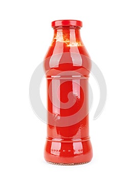 Tomato sauce in a glass jar on a white background