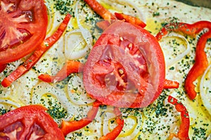 Tomato slice detail of traditional Italian focaccia bread