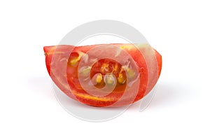 Tomato slice isolated on white background with clipping path by hand