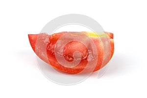 Tomato slice isolated on white background with clipping path by hand