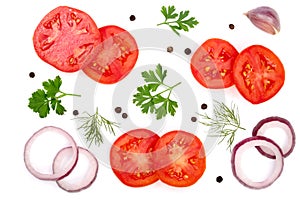 Tomato slice with parsley leaves, dill, onion, garlic and peppercorns isolated on white background. Top view