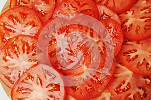 Tomato slices close up. Food vegetable background