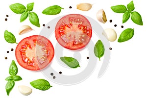 tomato slices with garlic and basil isolated on white background, top view