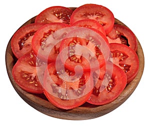 Tomato slices in a wooden bowl on a white