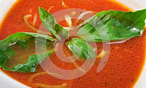 Tomato soup in ceramic bowl