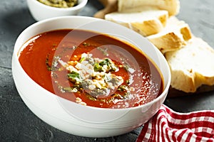 Tomato soup with cheese and pesto sauce