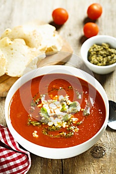 Tomato soup with cheese and pesto sauce