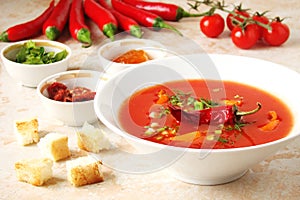 Tomato soup with chilli peppers, sweet peppers, garlic, herbs an